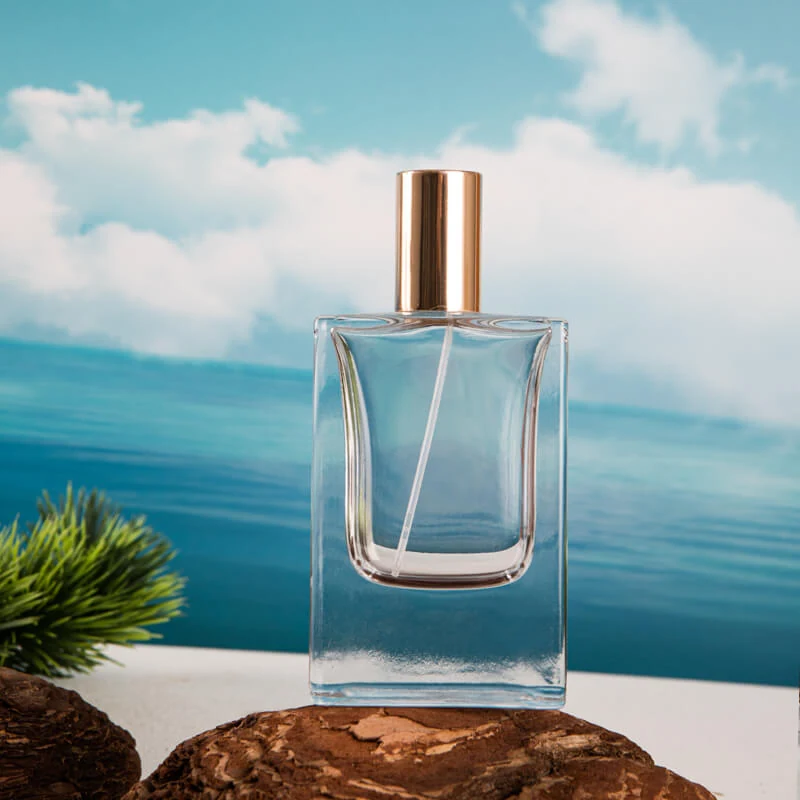 Tapered Clear Perfume Bottle with Gold-Tone Cylinder Cap