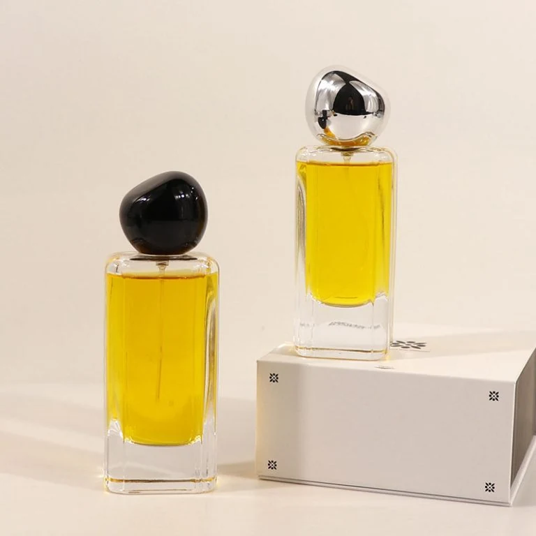 Tall Perfume Bottles with Rounded Sculptural Caps