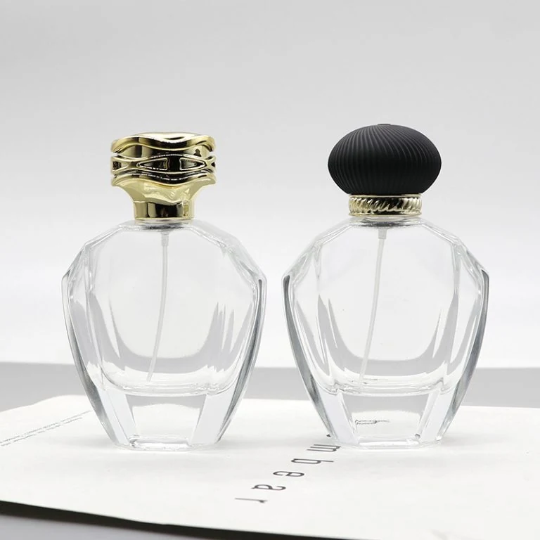 Fasetowane owalne butelki na perfumy z ozdobnymi nakrętkami