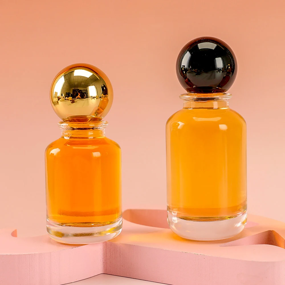 Butelki na perfumy z okrągłymi ramionami i zakrętkami