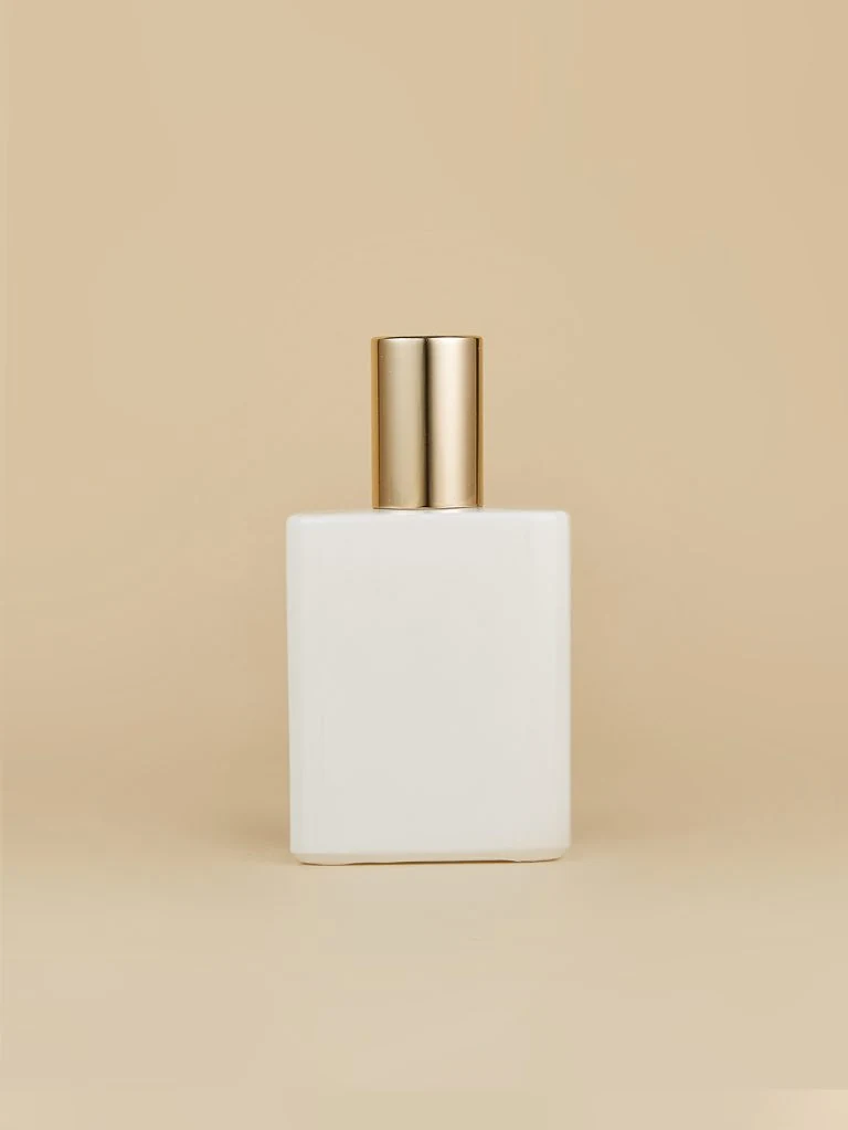 White Rectangular Perfume Bottle with Gold-Tone Cap