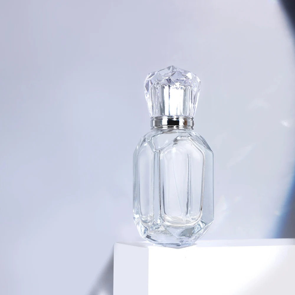 Faceted Oval Perfume Bottle with Jewel-Style Clear Cap