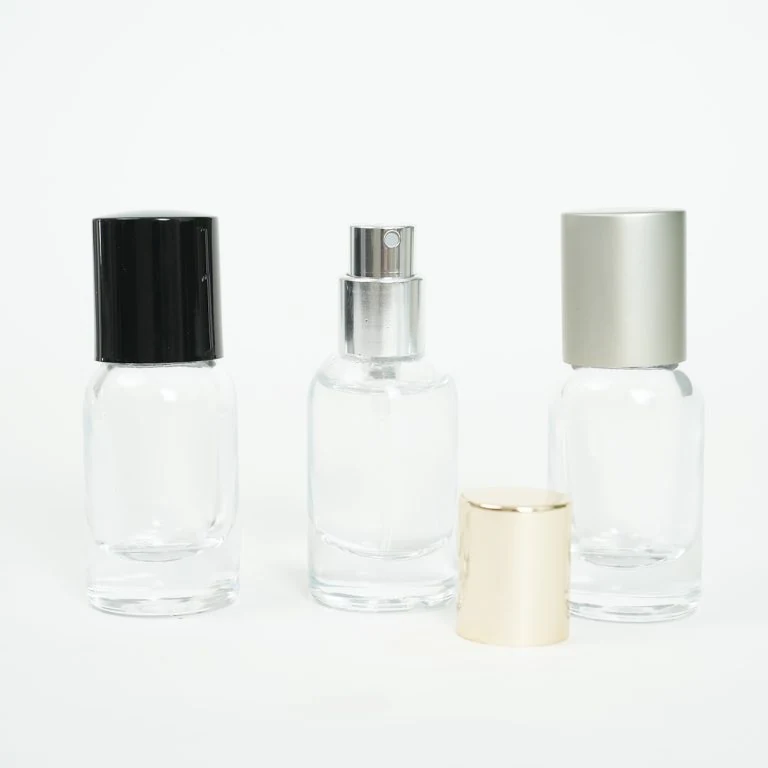 Small Rounded Perfume Bottles with Black and White Caps