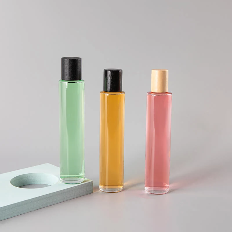 Slim Cylinder Perfume Bottles in Pastel-Tone Finishes